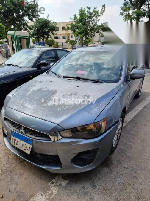 ميتسوبيشي لانسر 2016 فضي مستعملة للبيع - 1