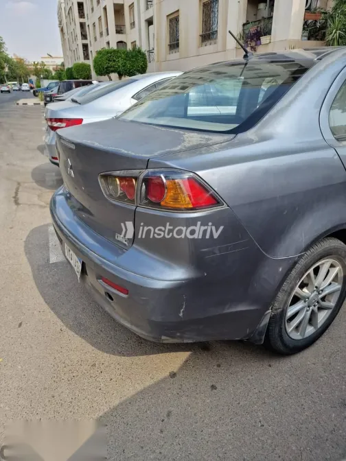 ميتسوبيشي لانسر 2016 فضي مستعملة للبيع - 3