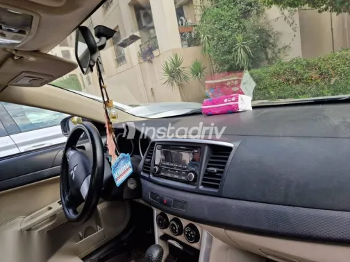 ميتسوبيشي لانسر 2016 فضي مستعملة للبيع - 5