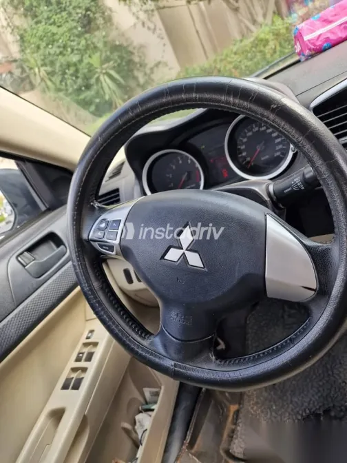 ميتسوبيشي لانسر 2016 فضي مستعملة للبيع - 7