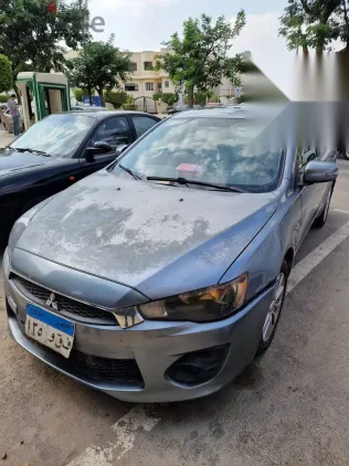ميتسوبيشي لانسر 2016 فضي مستعملة للبيع