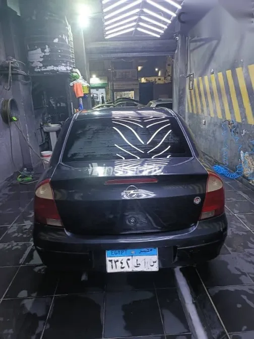 اوبل كورسا 2004 أسود مستعملة للبيع - 1