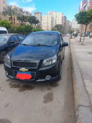 شيفروليه افيو 2015 أسود مستعملة للبيع