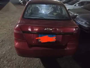 شيفروليه افيو 2009 أحمر مستعملة للبيع