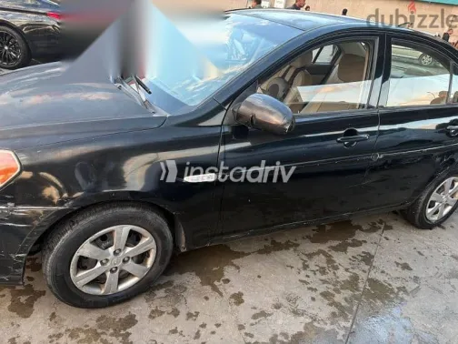هيونداي اكسنت 2009 أسود مستعملة للبيع - 7