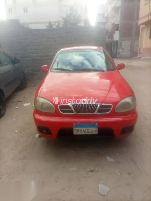 دايو لانوس 2002 أحمر مستعملة للبيع - 1