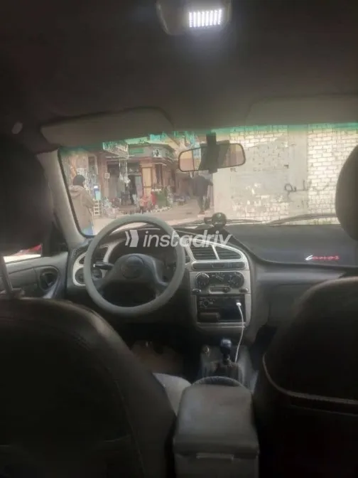 دايو لانوس 2002 أحمر مستعملة للبيع - 4