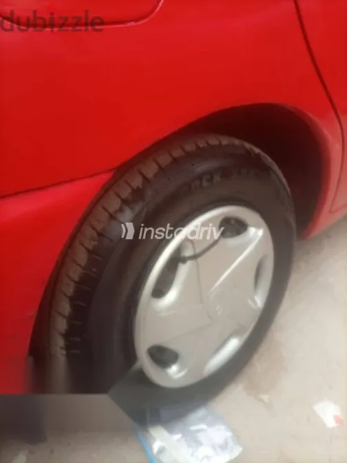 دايو لانوس 2002 أحمر مستعملة للبيع - 8