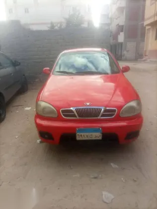 دايو لانوس 2002 أحمر مستعملة للبيع