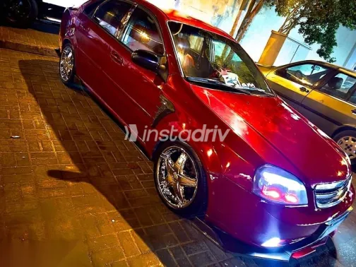 Chevrolet Optra 2010 Red Used for Sale - 1