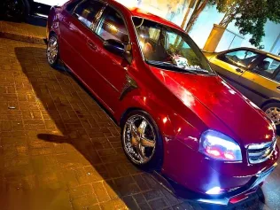 شيفروليه أوبترا 2010 أحمر مستعملة للبيع