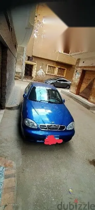 دايو لانوس 2004 أزرق غامق مستعملة للبيع