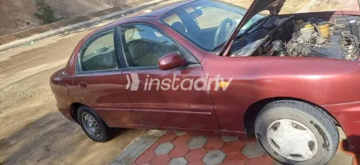 شيفروليه لانوس 2010 أحمر غامق مستعملة للبيع - 4