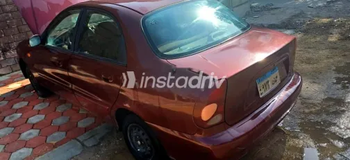 شيفروليه لانوس 2010 أحمر غامق مستعملة للبيع - 5