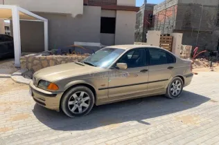 بي ام دبليو 318 2001 ذهبي مستعملة للبيع