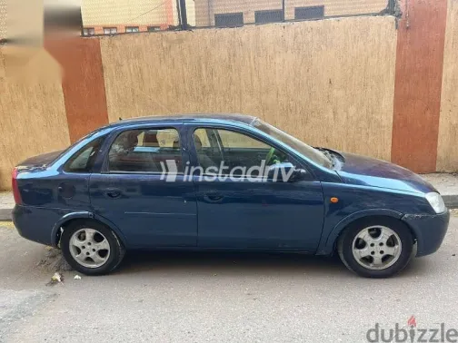 اوبل كورسا 2003 أزرق غامق مستعملة للبيع - 2