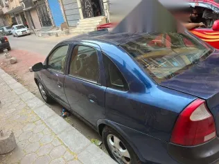 اوبل كورسا 2003 أزرق غامق مستعملة للبيع