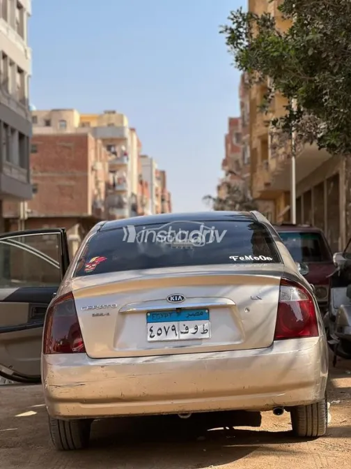 كيا سيراتو 2006 ذهبي مستعملة للبيع - 5