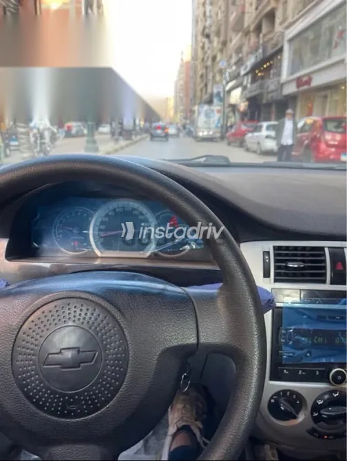 شيفروليه أوبترا 2010 فضي مستعملة للبيع - 1