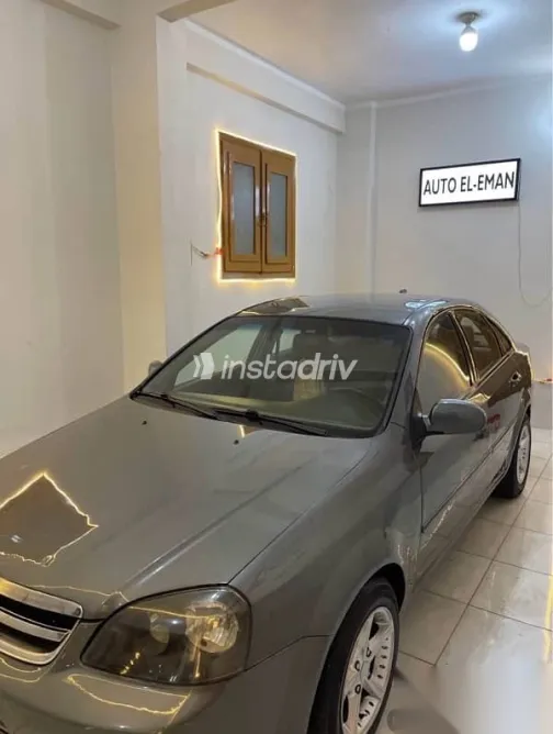 شيفروليه أوبترا 2010 فضي مستعملة للبيع - 3