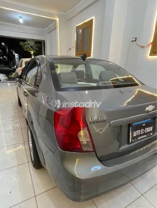 شيفروليه أوبترا 2010 فضي مستعملة للبيع - 4