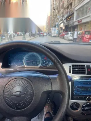 شيفروليه أوبترا 2010 فضي مستعملة للبيع