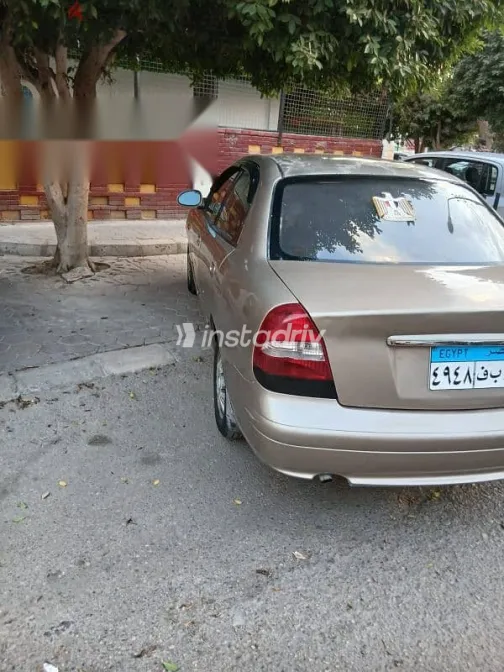 دايو نوبيرا 2003 ذهبي مستعملة للبيع - 5