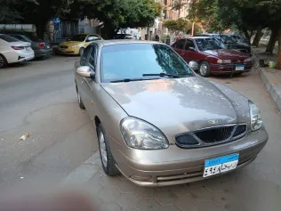 دايو نوبيرا 2003 ذهبي مستعملة للبيع