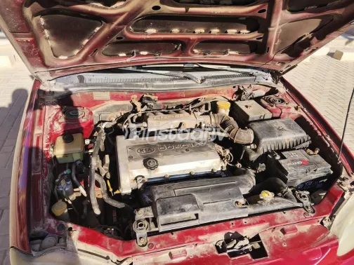 كيا سيفيا 2000 أحمر غامق مستعملة للبيع - 1