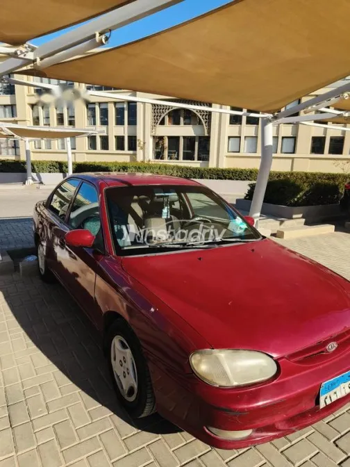 كيا سيفيا 2000 أحمر غامق مستعملة للبيع - 5