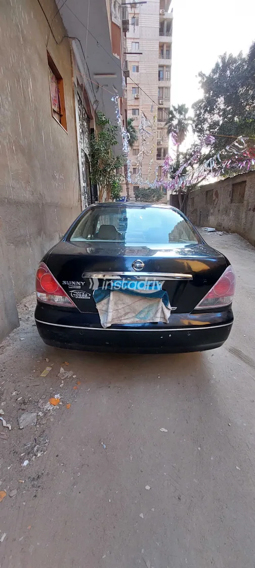 نيسان صنى 2013 أبيض مستعملة للبيع - 1