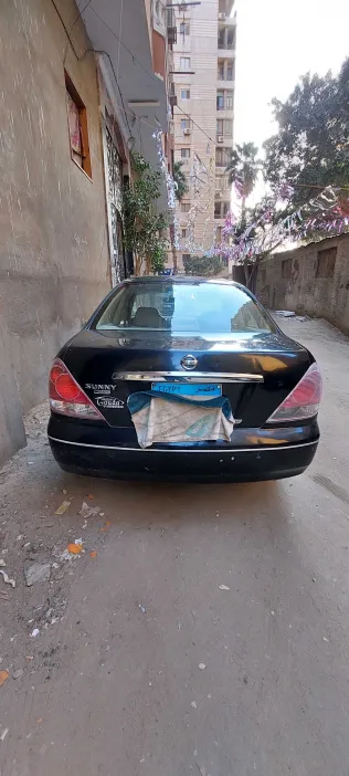 نيسان صنى 2013 أبيض مستعملة للبيع