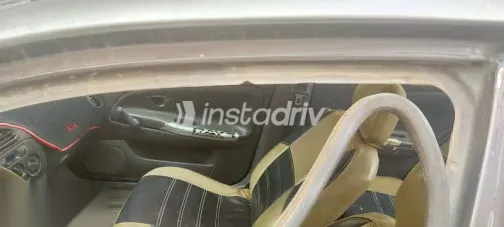 ميتسوبيشي لانسر 1999 رمادي مستعملة للبيع - 4