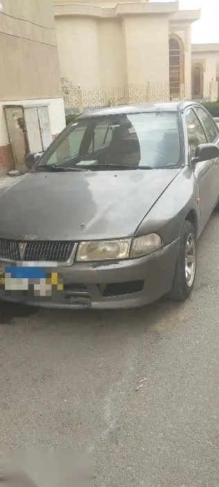 ميتسوبيشي لانسر 1999 رمادي مستعملة للبيع