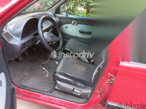 دايهاتسو كانشيل 1999 أحمر مستعملة للبيع - 4