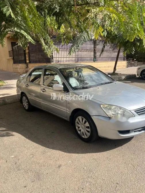 ميتسوبيشي لانسر بومة 2013 فضي مستعملة للبيع - 1