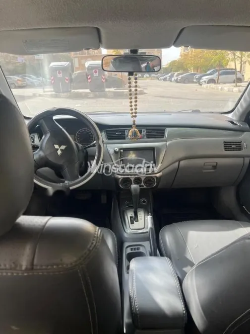 ميتسوبيشي لانسر بومة 2013 فضي مستعملة للبيع - 4