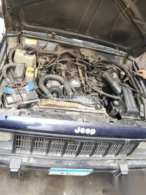 جيب شيروكي 1994 أزرق غامق مستعملة للبيع - 1