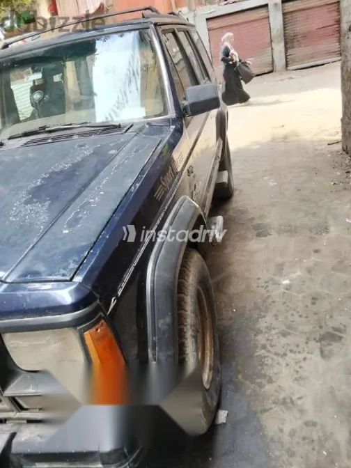 جيب شيروكي 1994 أزرق غامق مستعملة للبيع - 4