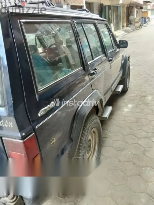 جيب شيروكي 1994 أزرق غامق مستعملة للبيع - 5