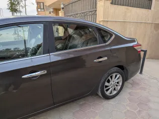 نيسان سنترا 2019 أبيض مستعملة للبيع