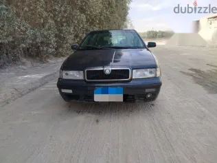 سكودا اوكتافيا 1999 أبيض مستعملة للبيع