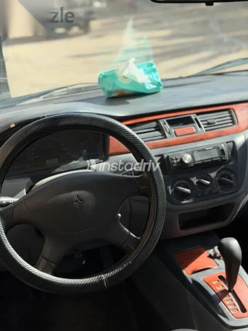 ميتسوبيشي لانسر 2003 فضي مستعملة للبيع - 4