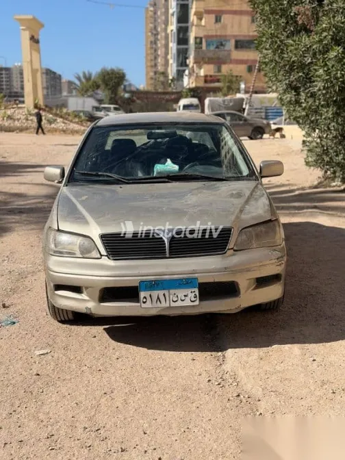 ميتسوبيشي لانسر 2003 فضي مستعملة للبيع - 6