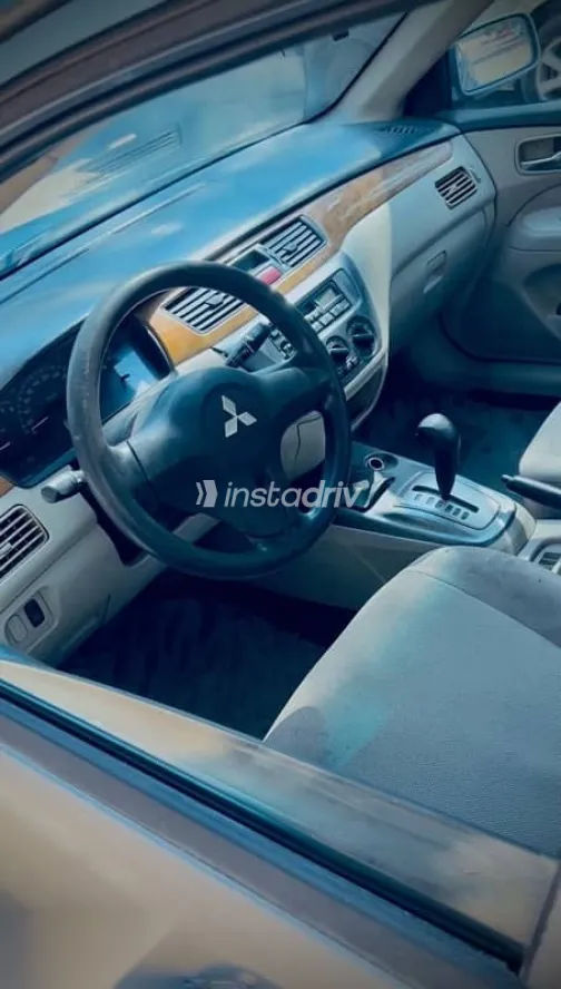 ميتسوبيشي لانسر 2009 فضي مستعملة للبيع - 1