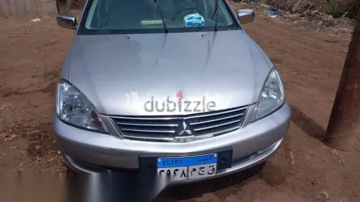 ميتسوبيشي لانسر 2011 فضي مستعملة للبيع - 5