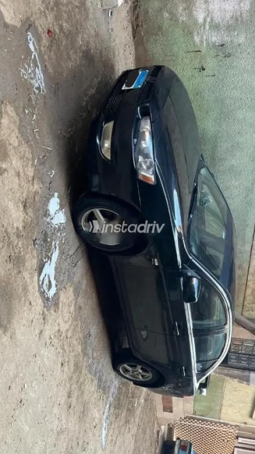 ميتسوبيشي لانسر اى اكس شارك 2009 أسود مستعملة للبيع - 1