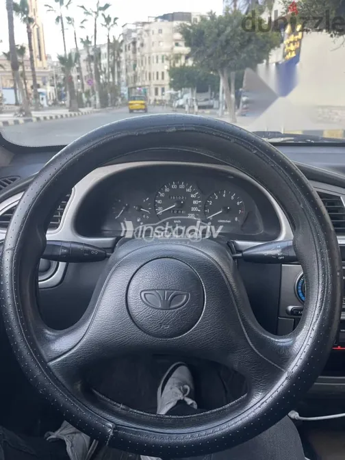 دايو لانوس 2005 رمادي مستعملة للبيع - 7