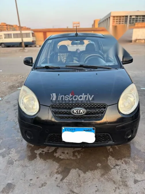 كيا بيكانتو 2011 أسود مستعملة للبيع - 1