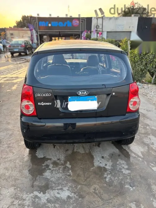 كيا بيكانتو 2011 أسود مستعملة للبيع - 2